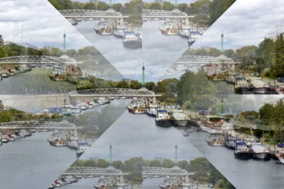 Fabienne · 13/09/2025 · 3840 x 2562 Cette photographie montre un port de plaisance avec des bateaux amarrés. La composition repose sur un effet de miroir ou de collage géométrique, formant des triangles superposés.Le cadrage est large, capturant une vue panoramique du port et des bâtiments environnants. La lumière est naturelle, légèrement voilée par des nuages, créant une ambiance douce et diffuse. Les couleurs dominantes sont des tons pastel et neutres, avec des touches de bleu et de vert.Le style est artistique et structuré, évoquant une ambiance à la fois sereine et dynamique.