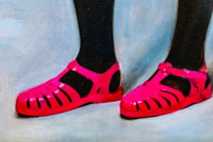 Jean-Paul · 16/10/2025 · 4032 x 2688 Cette photographie met en scène deux pieds chaussés de sandales roses à lanières noires. Le sujet principal est ces chaussures, aux couleurs vives et contrastées.La composition est simple et centrée, avec un cadrage serré sur les pieds et les chaussures. La lumière semble douce et uniforme, sans ombres marquées. Les couleurs dominantes sont le rose vif des sandales et le noir des lanières, sur un fond neutre et légèrement bleuté.Le style est épuré et direct, évoquant une ambiance à la fois ludique et minimaliste.