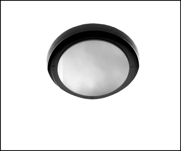 Thierry · 21/02/2026 · 4680 x 3912 Cette photographie montre un **réverbère ou un luminaire circulaire** comme sujet principal. Le cadrage est serré, centré sur l'objet, avec un fond uni et neutre.La lumière est douce et uniforme, sans ombre marquée. Les **couleurs dominantes** sont le **noir** (bordure) et le **gris métallisé** (surface). Le style est épuré et minimaliste, évoquant une ambiance industrielle et moderne. L'image dégage une sensation de simplicité et de fonctionnalité, presque clinique.