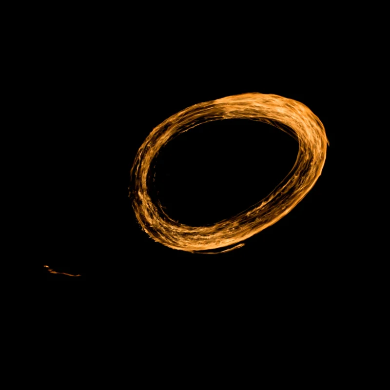 Fabienne · 24/01/2026 · 2975 x 2975 Cette photographie met en scène un **anneau lumineux doré** flottant dans l’obscurité, semblant former une boucle parfaite. La **composition** est épurée, centrée sur ce sujet principal, avec un léger point noir en bas à gauche, ajoutant une touche de contraste.Le **cadrage** est serré, isolant l’anneau dans un fond noir profond. La **lumière** est douce et diffuse, soulignant les contours de l’anneau sans ombres marquées. Les **couleurs dominantes** sont le **doré chaud** et le **noir intense**, créant une ambiance **mystérieuse et hypnotique**. Le style évoque une **abstraction lumineuse**, presque onirique.